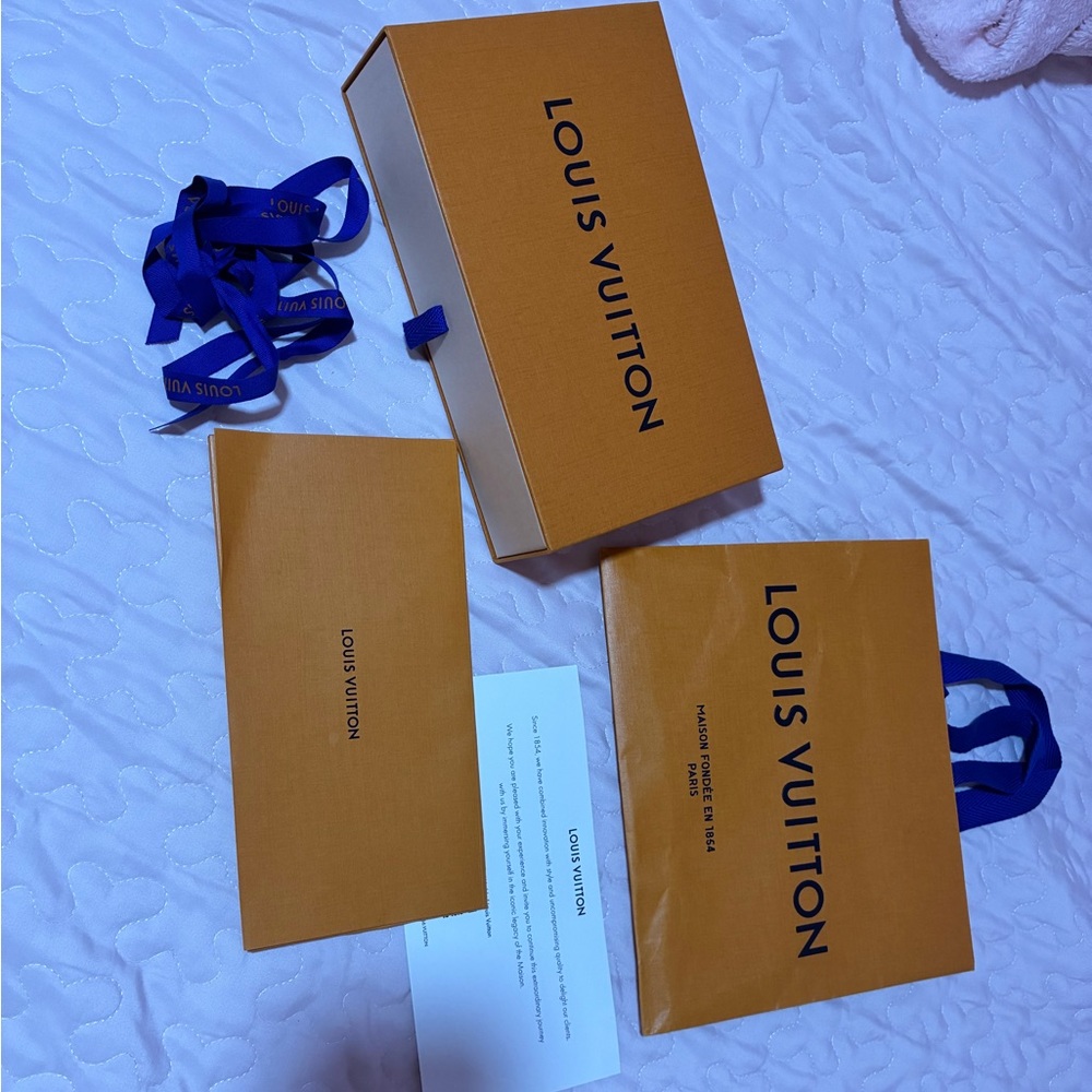 Authentic Louis Vuitton Empty Box with Blue Ribbon.